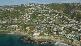 AX0159_208 - 7.6K aerial stock footage of oceanfront homes, Laguna Beach, California