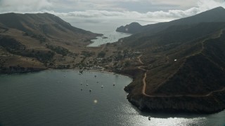 AX0160_008E - 7.6K aerial stock footage flyby the Two Harbors island community on Santa Catalina Island, California