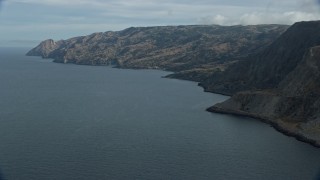 AX0160_020 - 7.6K stock footage aerial video of steep cliffs and coastline of Santa Catalina Island, California