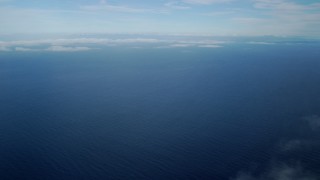 AX0160_023 - 7.6K stock footage aerial video of low level clouds and open water in the Pacific Ocean off the coast of Southern California