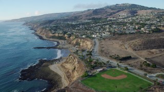 AX0161_018 - 7.6K stock footage aerial video of White Point Park and coastal neighborhoods in San Pedro, California