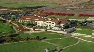 AX0161_022 - 7.6K stock footage aerial video of Trump National Golf Club clubhouse in Rancho Palos Verdes, California