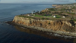 AX0161_027 - 7.6K stock footage aerial video approaching and flying by the Point Vicente Lighthouse in Rancho Palos Verdes, California
