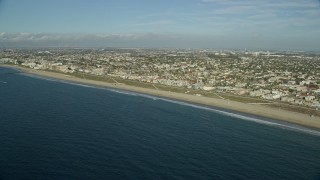 AX0161_034E - 7.6K aerial stock footage approaching Torrance Beach in the seaside city of Redondo Beach, California