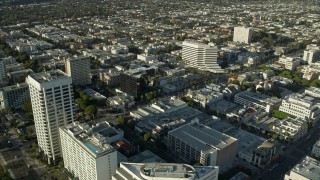 AX0161_073E - 7.6K aerial stock footage of office buildings by PCH and Ocean Avenue in Santa Monica, California