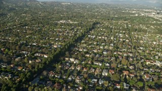 AX0161_084E - 7.6K aerial stock footage of upscale neighborhoods in Santa Monica and Brentwood, California