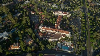 AX0161_110 - 7.6K aerial stock footage of a reverse view of the Beverly Hills Hotel in Beverly Hills, California