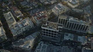 AX0161_114E - 7.6K aerial stock footage flying over and circling office buildings and shops in Beverly Hills, California