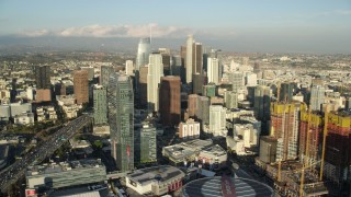 AX0162_006 - 7.6K stock footage aerial video of tall skyscrapers, The Ritz-Carlton, and reveal Oceanwide Plaza in Downtown Los Angeles, California