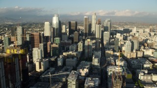 AX0162_007 - 7.6K stock footage aerial video of Oceanwide Plaza and a view of tall skyscrapers in Downtown Los Angeles, California