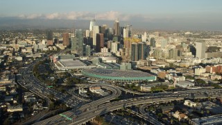AX0162_017 - 7.6K stock footage aerial video approaching Downtown Los Angeles, California from the 10 / 110 interchange