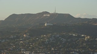 AX0162_045 - 7.6K aerial stock footage of the Hollywood Sign and Griffith Observatory in Los Angeles, California