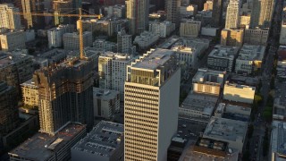 AX0162_068 - 7.6K aerial stock footage orbiting Transamerica Center at twilight in Downtown Los Angeles, California