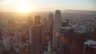 AX0162_082E - 7.6K aerial stock footage orbiting of US Bank Tower at sunset in Downtown Los Angeles, California