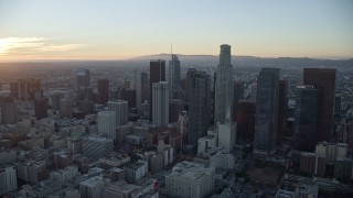 AX0162_089 - 7.6K aerial stock footage approaching Gas Company Tower and US Bank Tower at twilight in Downtown Los Angeles, California