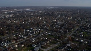 AX0165_0003 - 4K aerial stock footage of flying over suburban neighborhoods in Lemont, Illinois