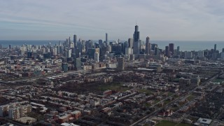 AX0165_0024 - 4K aerial stock footage of flying toward the Downtown Chicago, Illinois skyline from the West Side