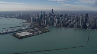 AX0165_0033 - 4K aerial stock footage of Navy Pier and waterfront skyscrapers in Downtown Chicago, Illinois