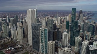 AX0165_0039 - 4K aerial stock footage approach Aon Center in Downtown Chicago, Illinois