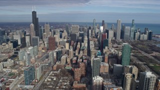 AX0165_0050 - 4K aerial stock footage of approaching the Downtown Chicago skyscrapers along State Street, Illinois