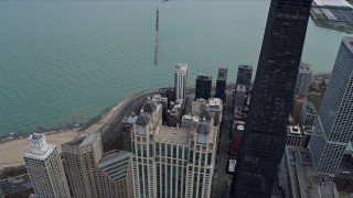 AX0165_0067 - 4K aerial stock footage fly over skyscrapers to reveal Lake Shore Drive and Navy Pier in Downtown Chicago, Illinois