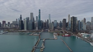 AX0165_0072 - 4K stock footage aerial video of approaching the Downtown Chicago skyline, Illinois