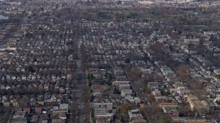 AX0166_0013 - 4K aerial stock footage of approaching urban neighborhoods in Northwest Side Chicago, Illinois