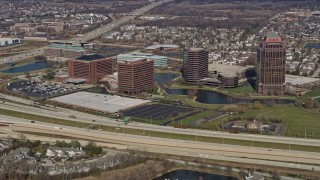AX0166_0024 - 4K aerial stock footage of office buildings in Itasca, Illinois