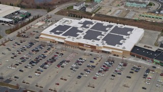 AX0166_0037 - 4K aerial stock footage of approaching a mall and tilting to a view of Target in Mundelein, Illinois