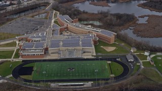 AX0166_0041 - 4K aerial stock footage of Grayslake North High School in Grayslake, Illinois