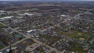 AX0166_0053 - 4K aerial stock footage of approaching and panning across a small town, Union Grove, Wisconsin
