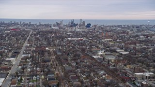 AX0166_0072 - 4K aerial stock footage of flying over urban neighborhoods toward the county courthouse in Milwaukee, Wisconsin