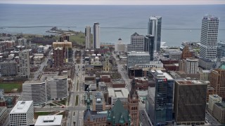 AX0166_0075 - 4K aerial stock footage of flying over the Associated Bank River Center office tower, Milwaukee, Wisconsin