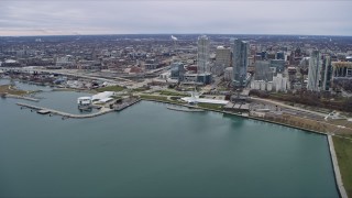 AX0166_0077 - 4K aerial stock footage of reverse view of skyscrapers and lakefront museums in Milwaukee, Wisconsin