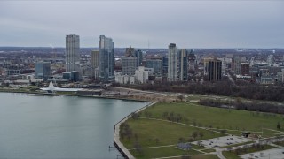 AX0167_0011 - 4K aerial stock footage of skyscrapers and Milwaukee Art Museum seen from the lake, Milwaukee, Wisconsin