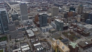 AX0167_0016 - 4K aerial stock footage flyby apartment tower and office buildings in downtown, Milwaukee, Wisconsin