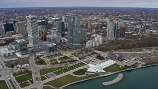 AX0167_0020 - 4K stock footage aerial video orbit tall skyscrapers and museum in downtown, Milwaukee, Wisconsin