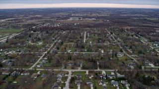 AX0167_0037 - 4K aerial stock footage of flying over suburban residential neighborhoods in Franklin, Wisconsin
