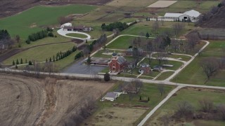 AX0167_0046 - 4K aerial stock footage of St. John the Baptist Catholic Church in Union Grove, Wisconsin