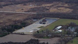 AX0167_0049 - 4K aerial stock footage of flying past the Gold Pyramid House in Wadsworth, Illinois