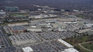 AX0167_0068 - 4K aerial stock footage of orbiting the Westfield Old Orchard shopping mall in Skokie, Illinois