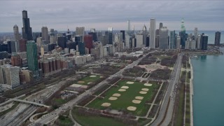 AX0167_0092 - 4K aerial stock footage of skyscrapers and city buildings around Grant Park in Downtown Chicago, Illinois