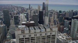 AX0167_0097 - 4K aerial stock footage of Trump Tower and skyscrapers seen from Chase Tower, Downtown Chicago, Illinois