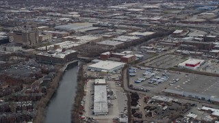 AX0168_0004 - 4K aerial stock footage of warehouse buildings beside Bubbly Creek, Southwest Side Chicago, Illinois