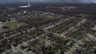 AX0168_0018 - 4K aerial stock footage of flying over suburban homes in Hickory Hills, Illinois