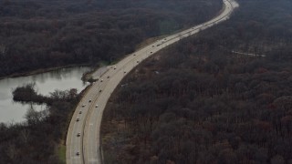 AX0168_0019 - 4K aerial stock footage of flying by light traffic on State Route 45 in Palos Hills, Illinois