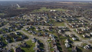 AX0168_0030 - 4K aerial stock footage of flying over a residential neighborhood in Lockport, Illinois