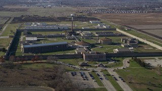 AX0168_0033 - 4K aerial stock footage approach and orbit the Stateville Correctional Center in Crest Hill, Illinois