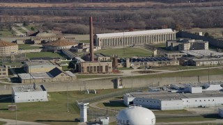 AX0168_0038 - 4K aerial stock footage of buildings at the Stateville Correctional Center prison in Crest Hill, Illinois