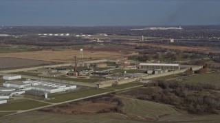 AX0168_0039 - 4K aerial stock footage of passing by the Stateville Correctional Center prison in Crest Hill, Illinois